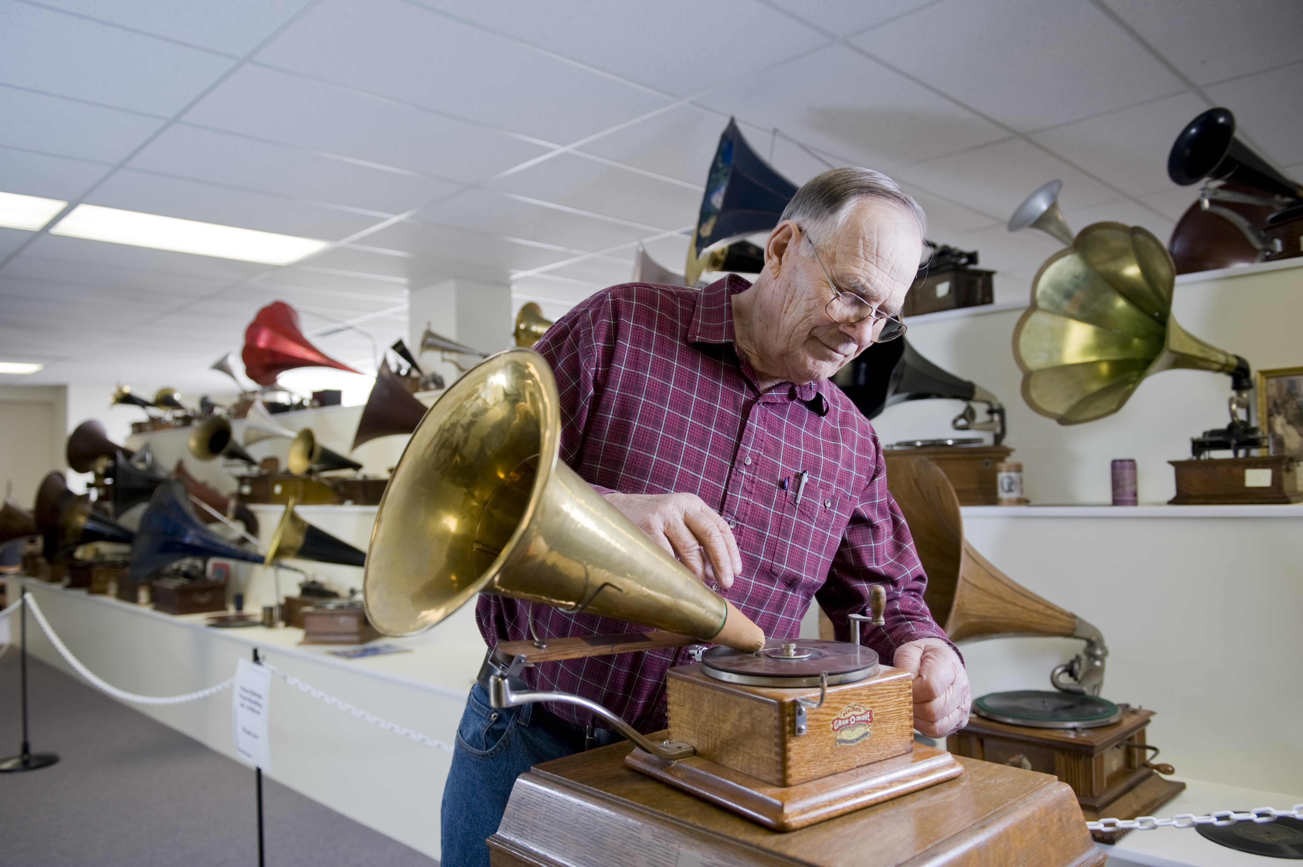 Photo of Bernard Wiese with his gramophone collection